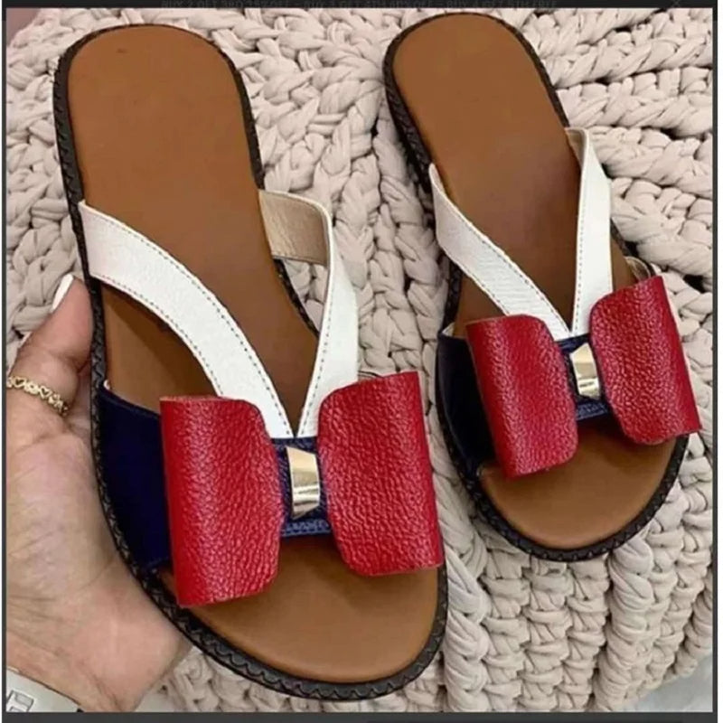 Butterfly button sandals with flat sole